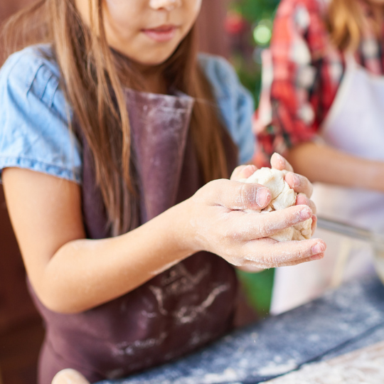 Kids kneading dough